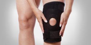 Knee brace on a person's knee